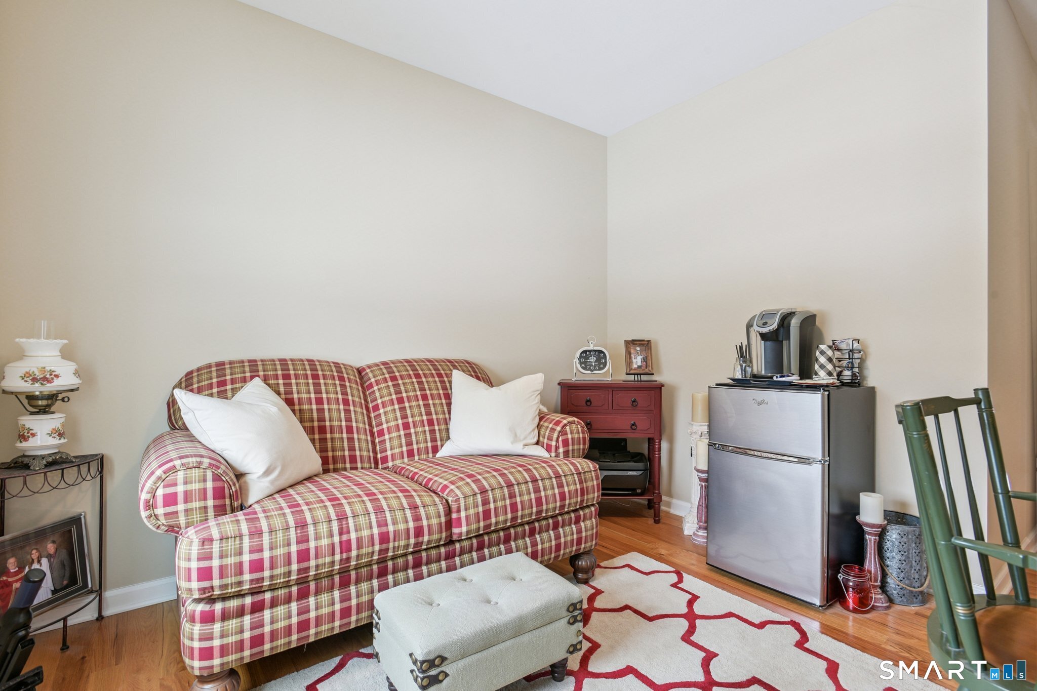 10 Ball Road North Haven, CT 06473 - Photo 23 of 35 a living room with furniture and a flat screen tv