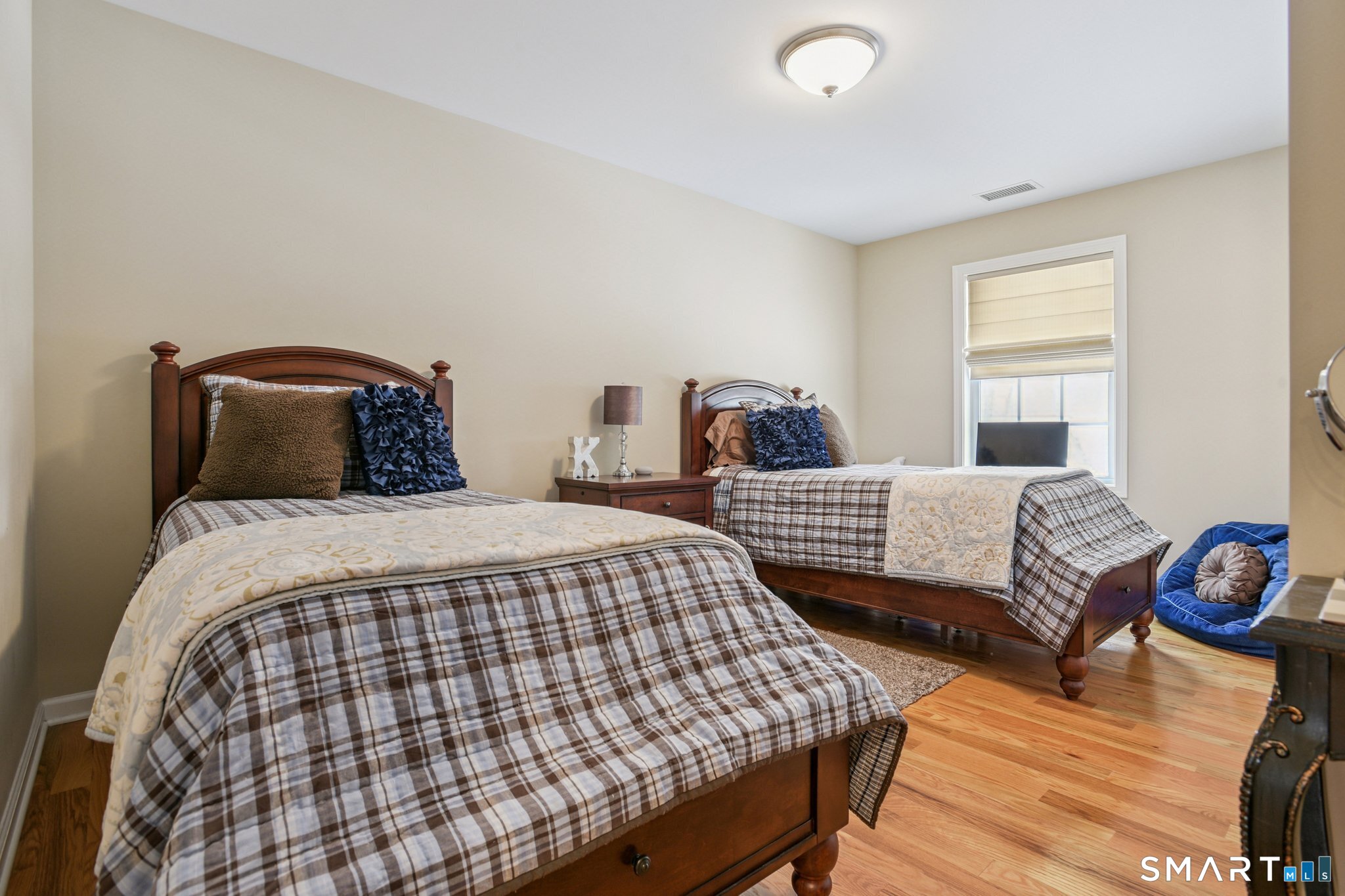 10 Ball Road North Haven, CT 06473 - Photo 24 of 35 a bedroom with double bed and a window