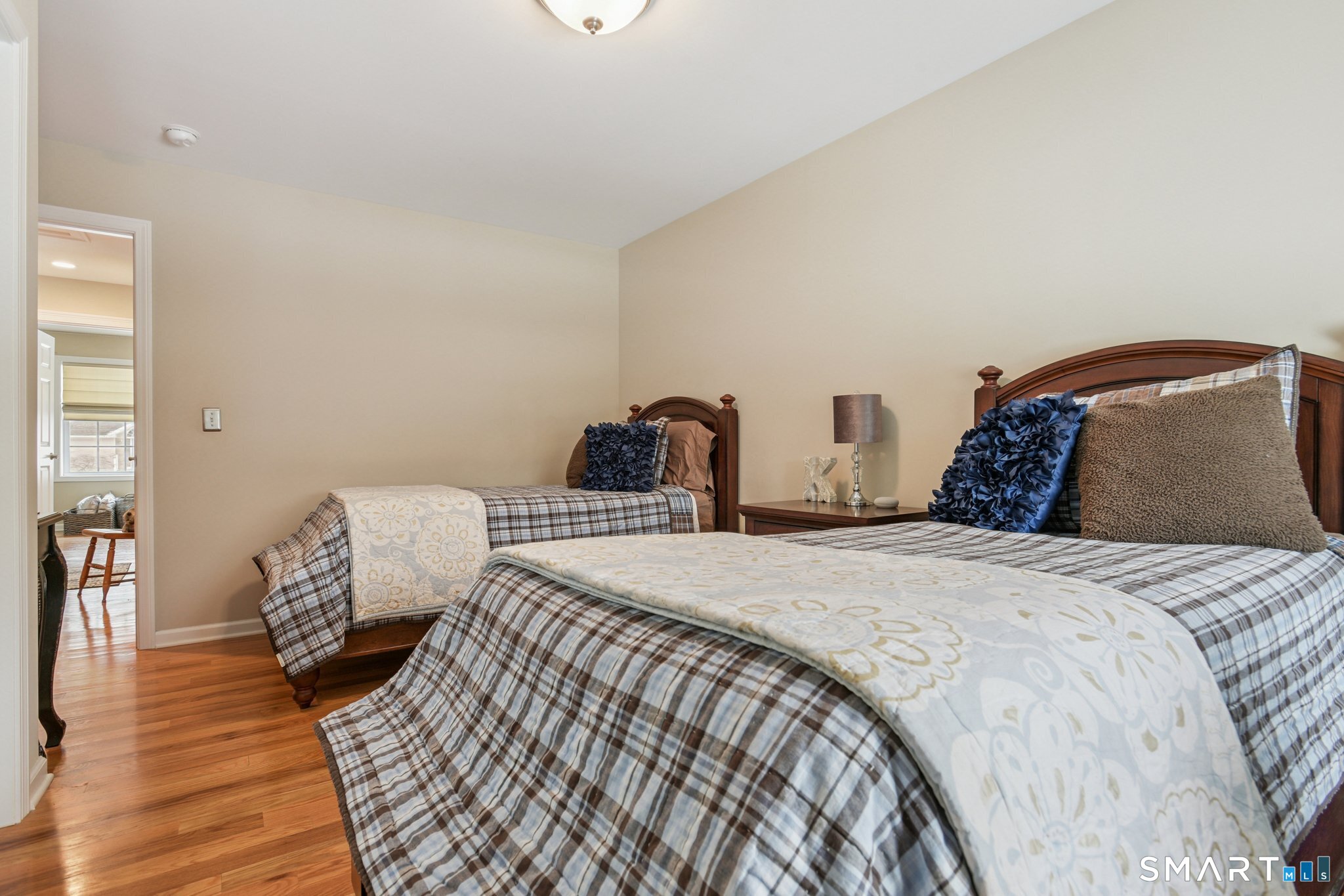 10 Ball Road North Haven, CT 06473 - Photo 25 of 35 a bedroom with two beds and wooden floor