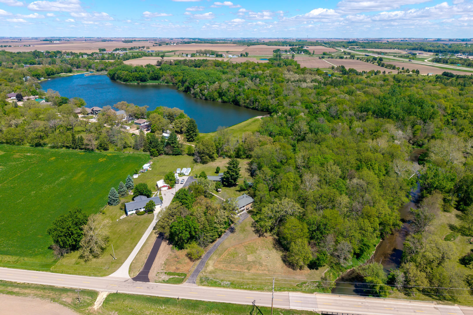 2660 252nd Street De Witt, IA 52742 - Photo 45 of 45 an aerial view of a residential houses with outdoor space and river
