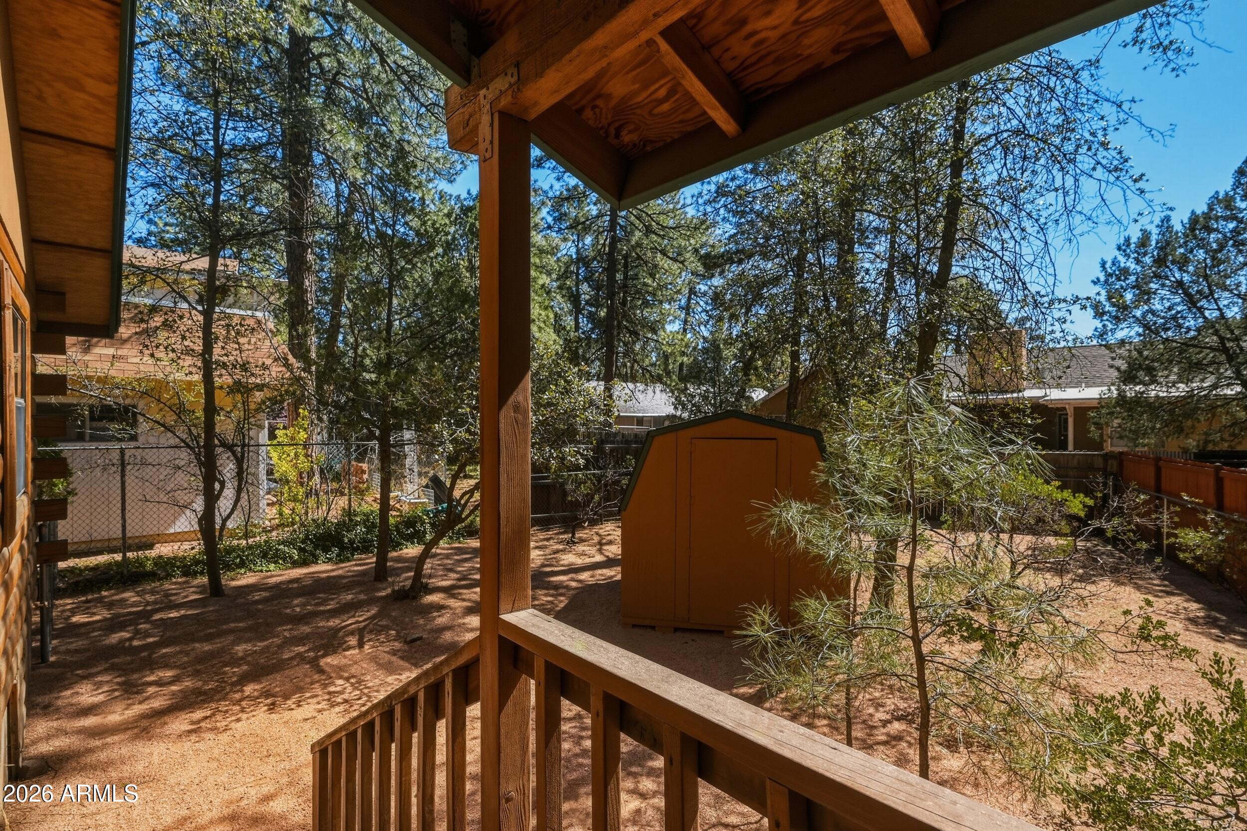 809 North Ponderosa Circle Payson, AZ 85541 - Photo 18 of 21 a view of a balcony with wooden floor and fence