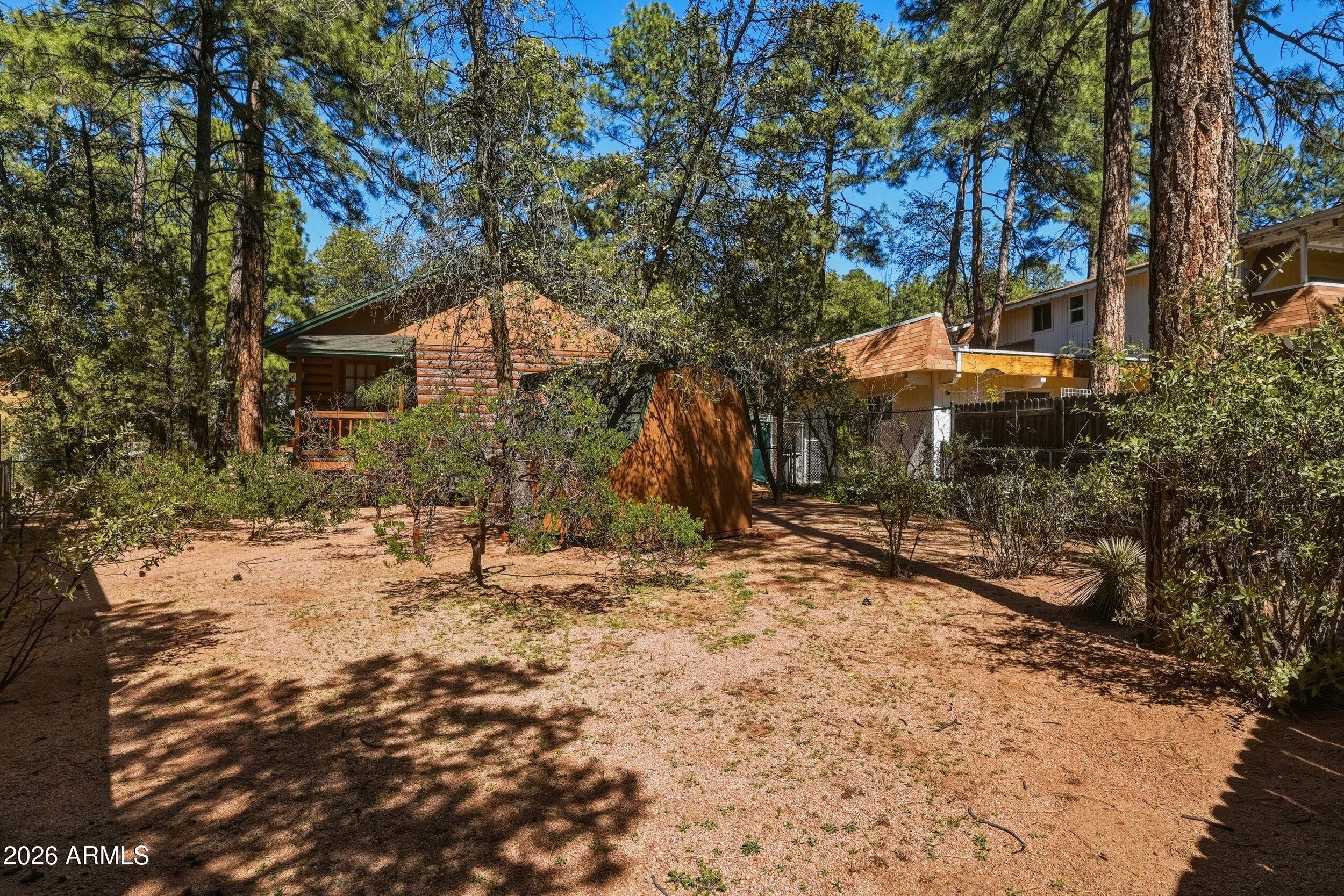 809 North Ponderosa Circle Payson, AZ 85541 - Photo 20 of 21 a backyard of a house with lots of green space