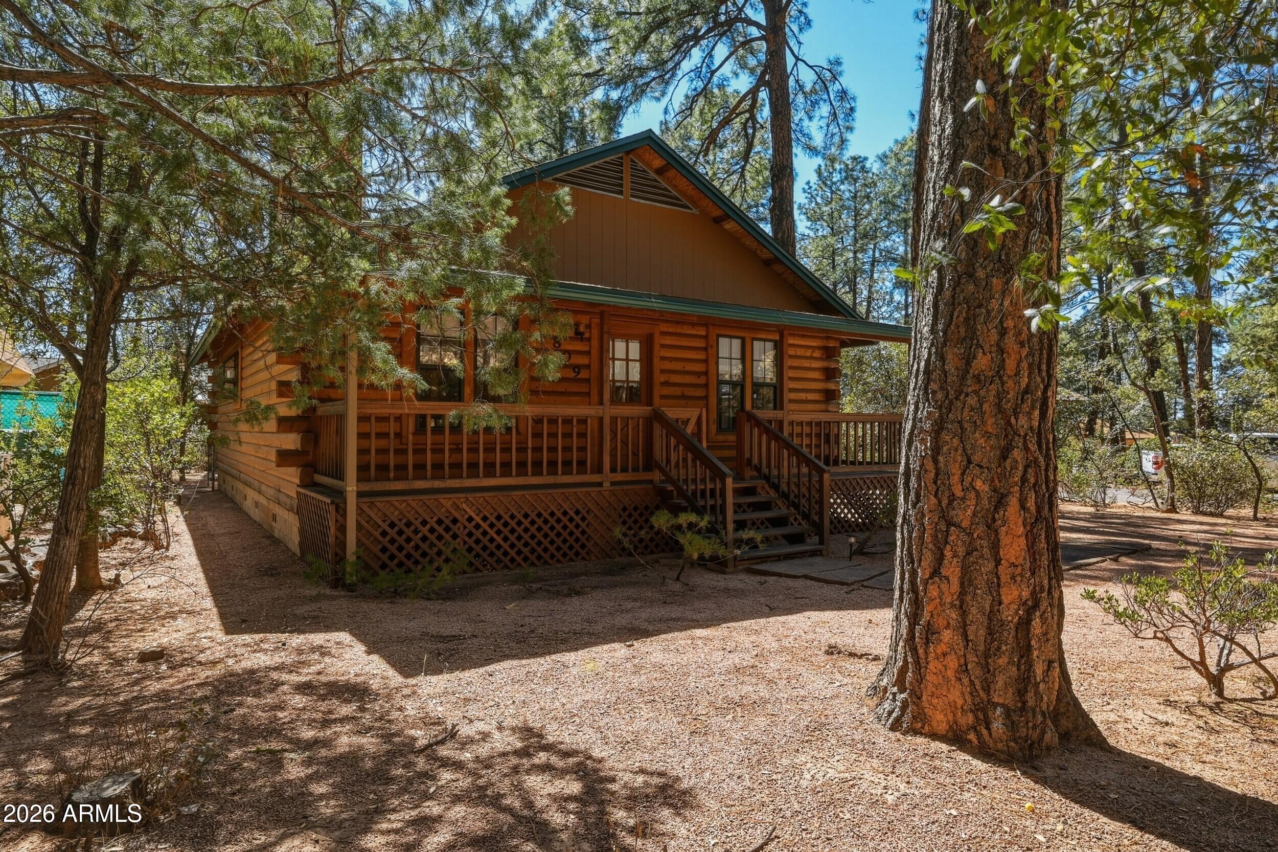 809 North Ponderosa Circle Payson, AZ 85541 - Photo 3 of 21 a view of a house with a tree in the background