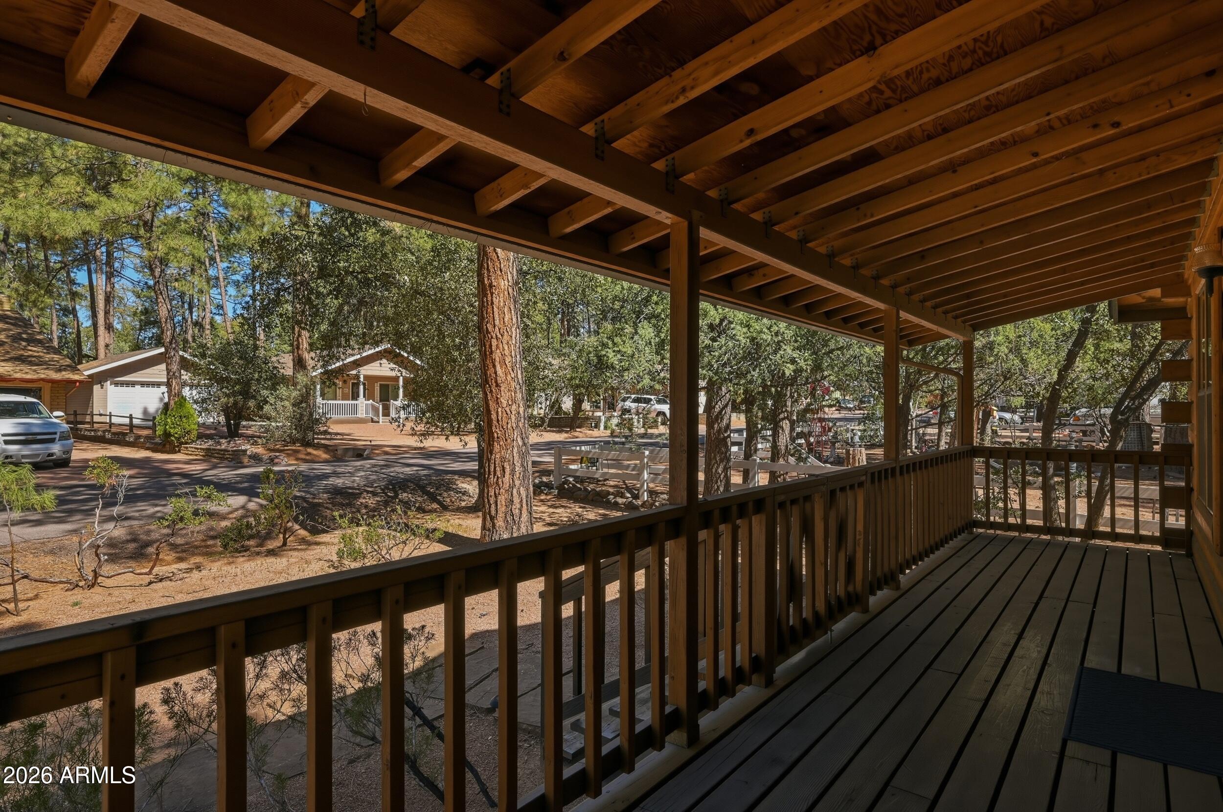 809 North Ponderosa Circle Payson, AZ 85541 - Photo 5 of 21 a view of a balcony with wooden floor