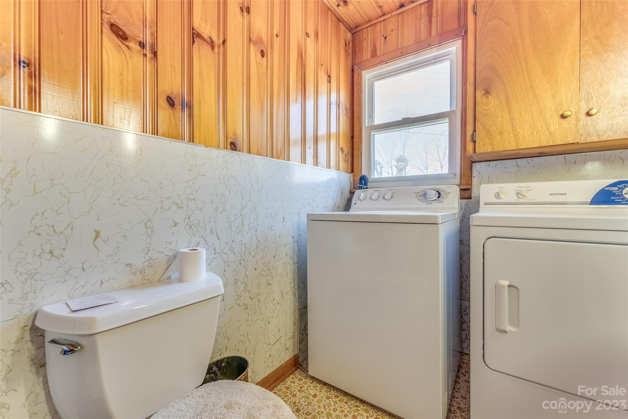 1345 Max Thompson Road Canton, NC 28716 - Photo 23 of 43 a bathroom with a sink a toilet and a window