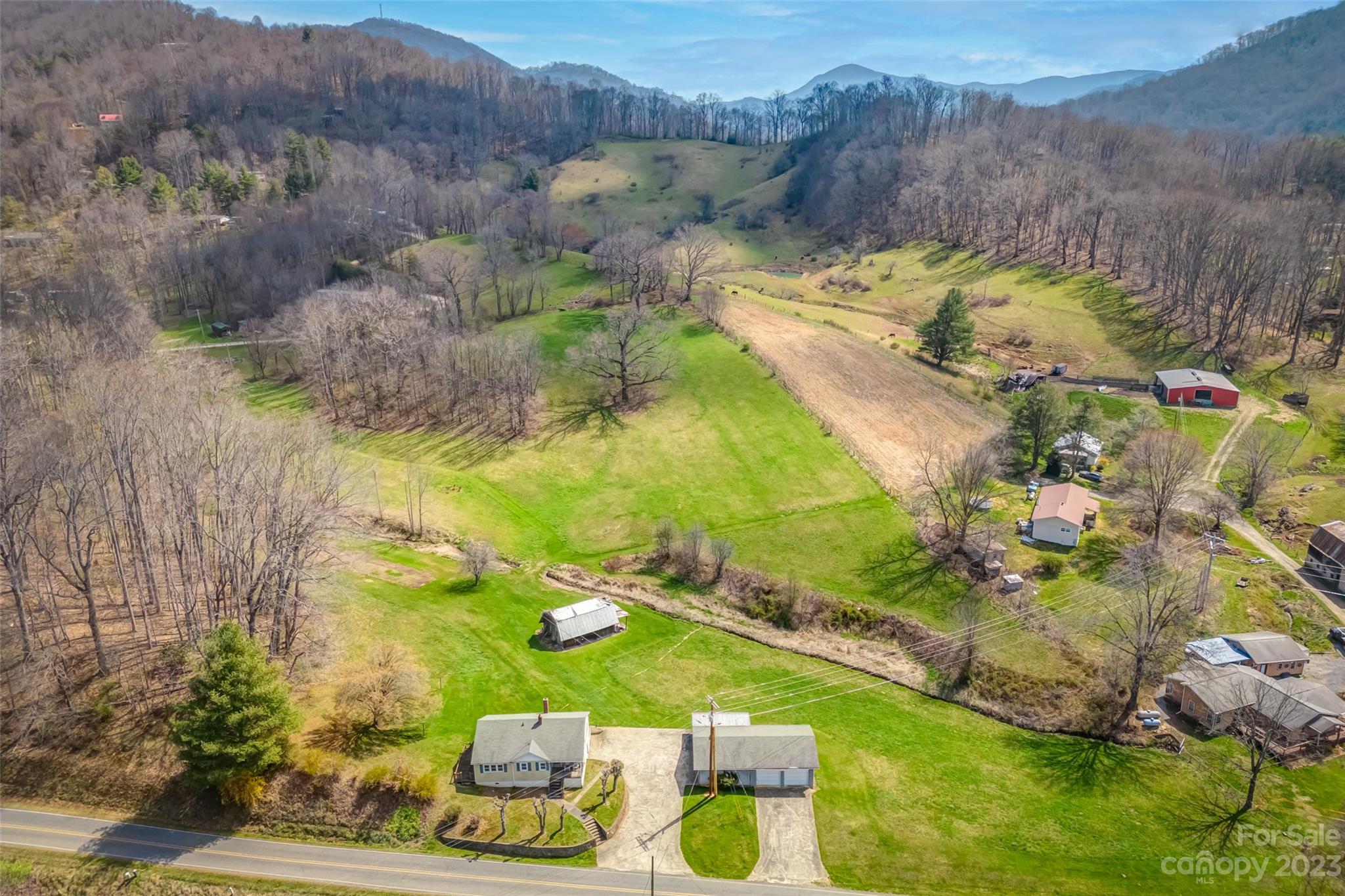 1345 Max Thompson Road Canton, NC 28716 - Photo 32 of 43 a view of a swimming pool with a yard