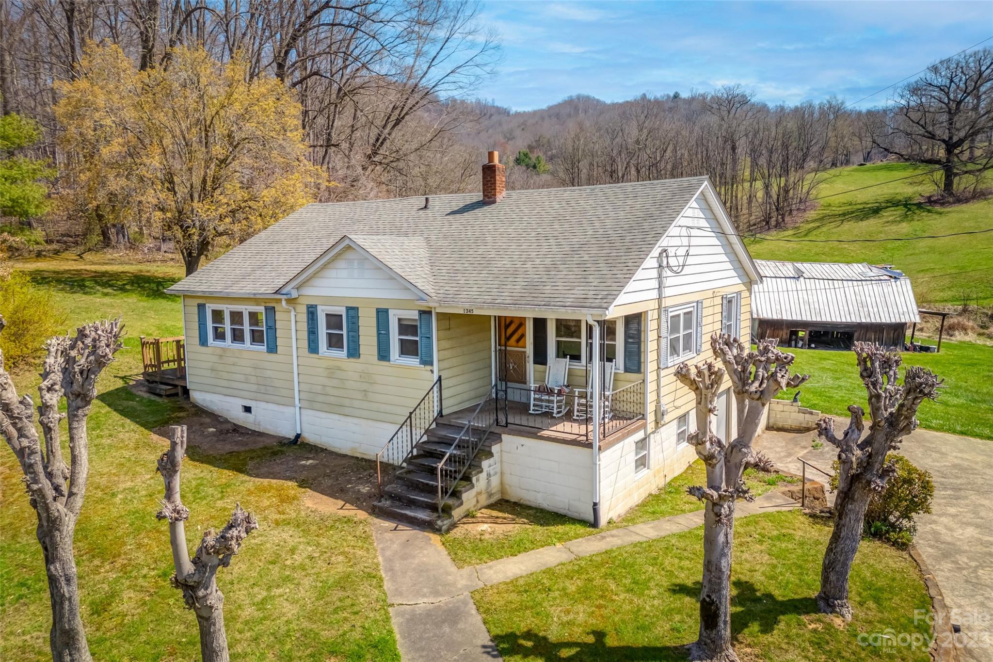 1345 Max Thompson Road Canton, NC 28716 - Photo 4 of 43 aerial view of a house with swimming pool and porch