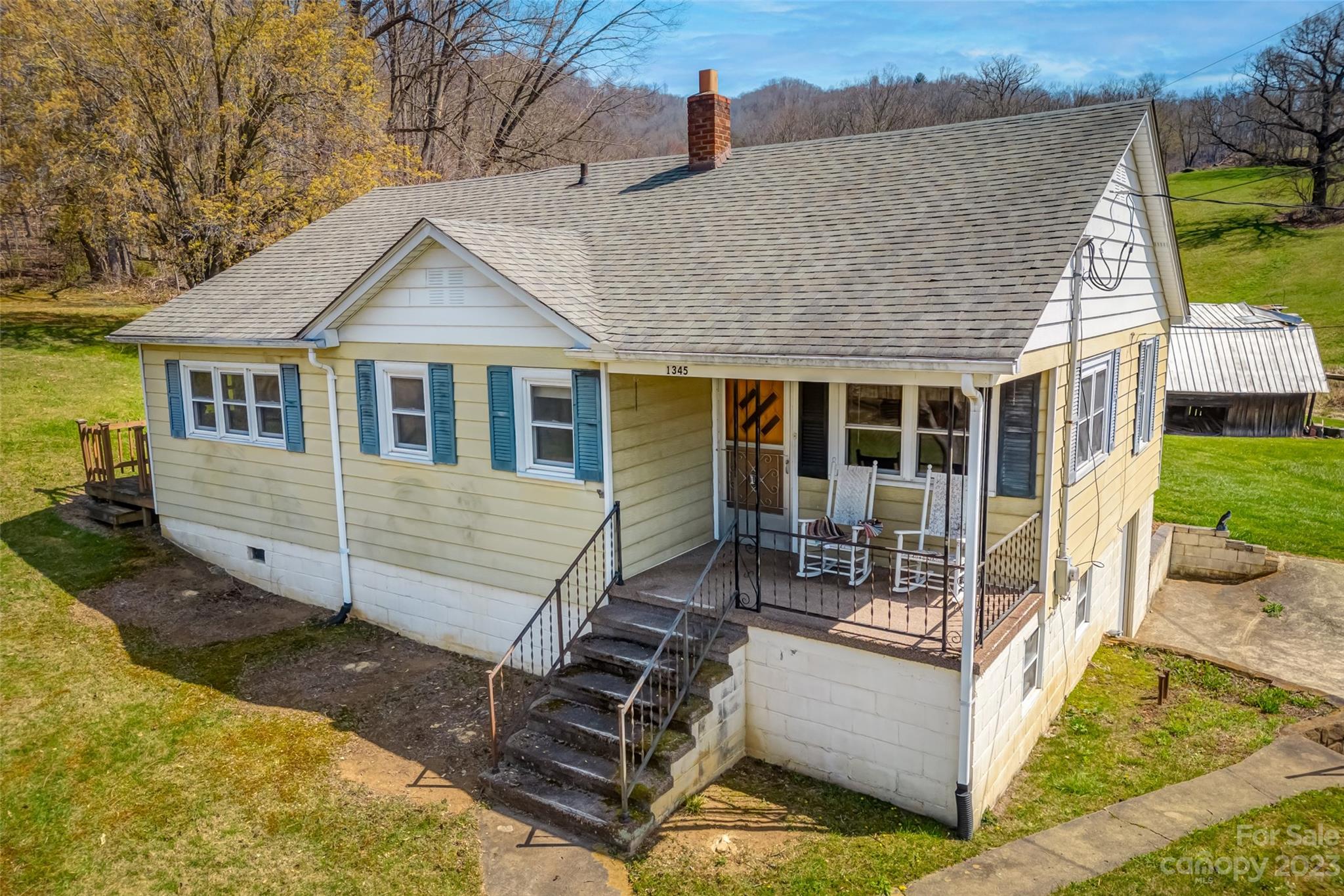 1345 Max Thompson Road Canton, NC 28716 - Photo 5 of 43 front view of a house with a patio