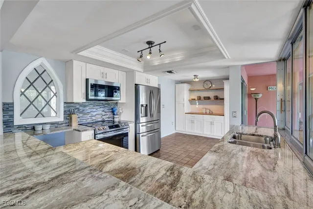 $565,000 | 4232 Southeast 8th Place, Cape Coral, FL 33904