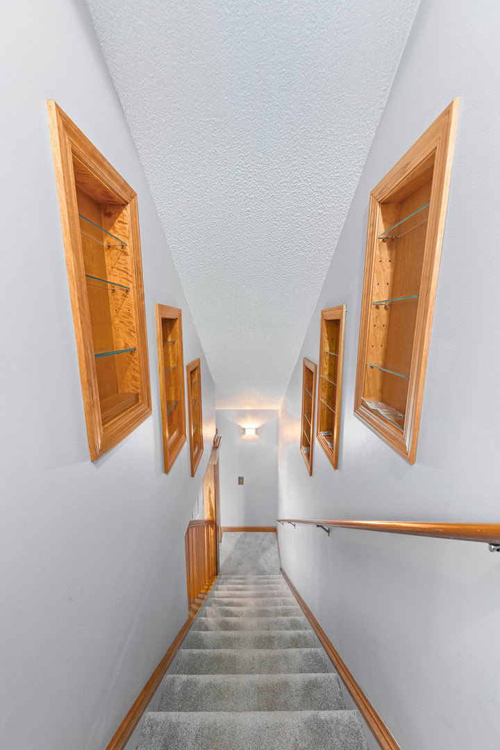 3342 Fox Hill Road Aurora, IL 60504 - Photo 15 of 25 a view of a hallway with windows