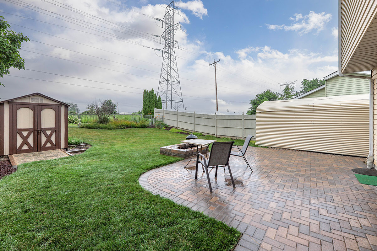 3342 Fox Hill Road Aurora, IL 60504 - Photo 23 of 25 a view of a bench in the garden