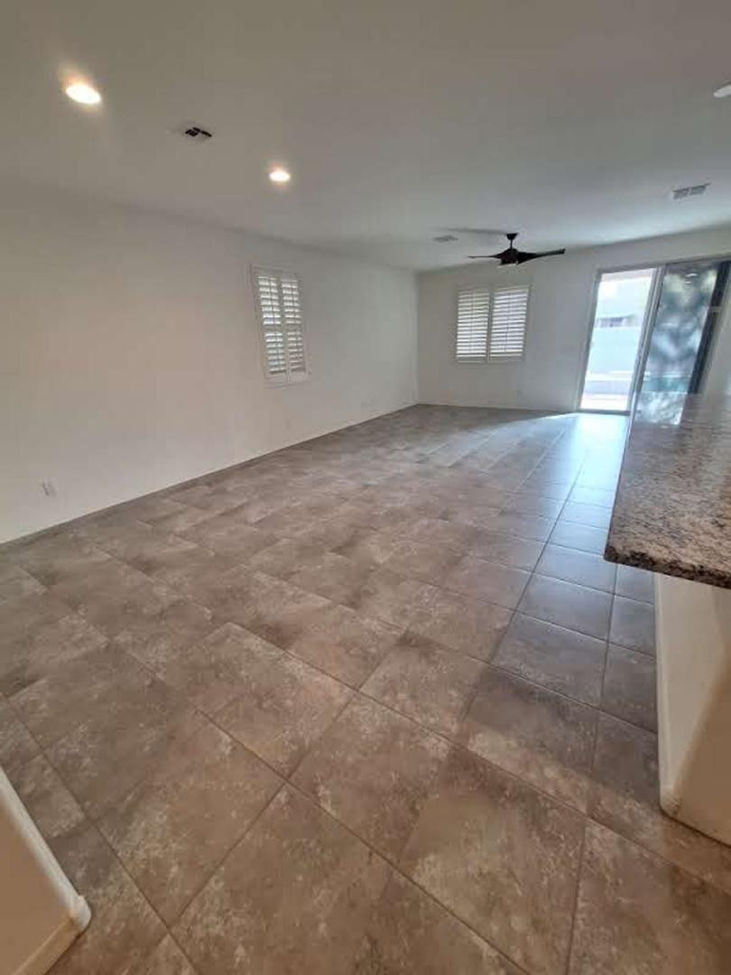 18541 West Mescal Street Surprise, AZ 85388 - Photo 11 of 31 a view of empty room with windows