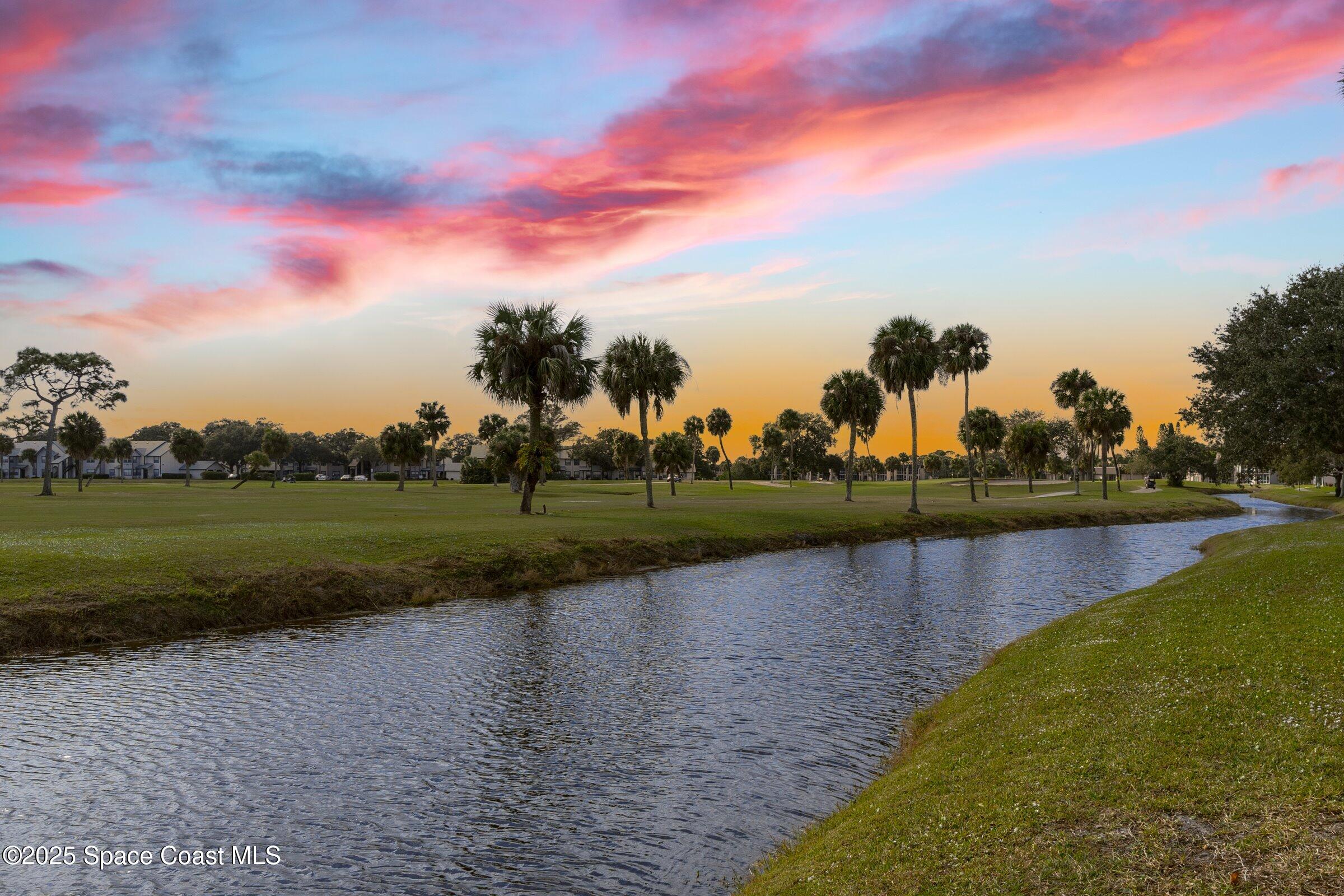 2727 North Wickham Road, Unit 11104 Melbourne, FL 32935 - Photo 32 of 55 a view of a lake
