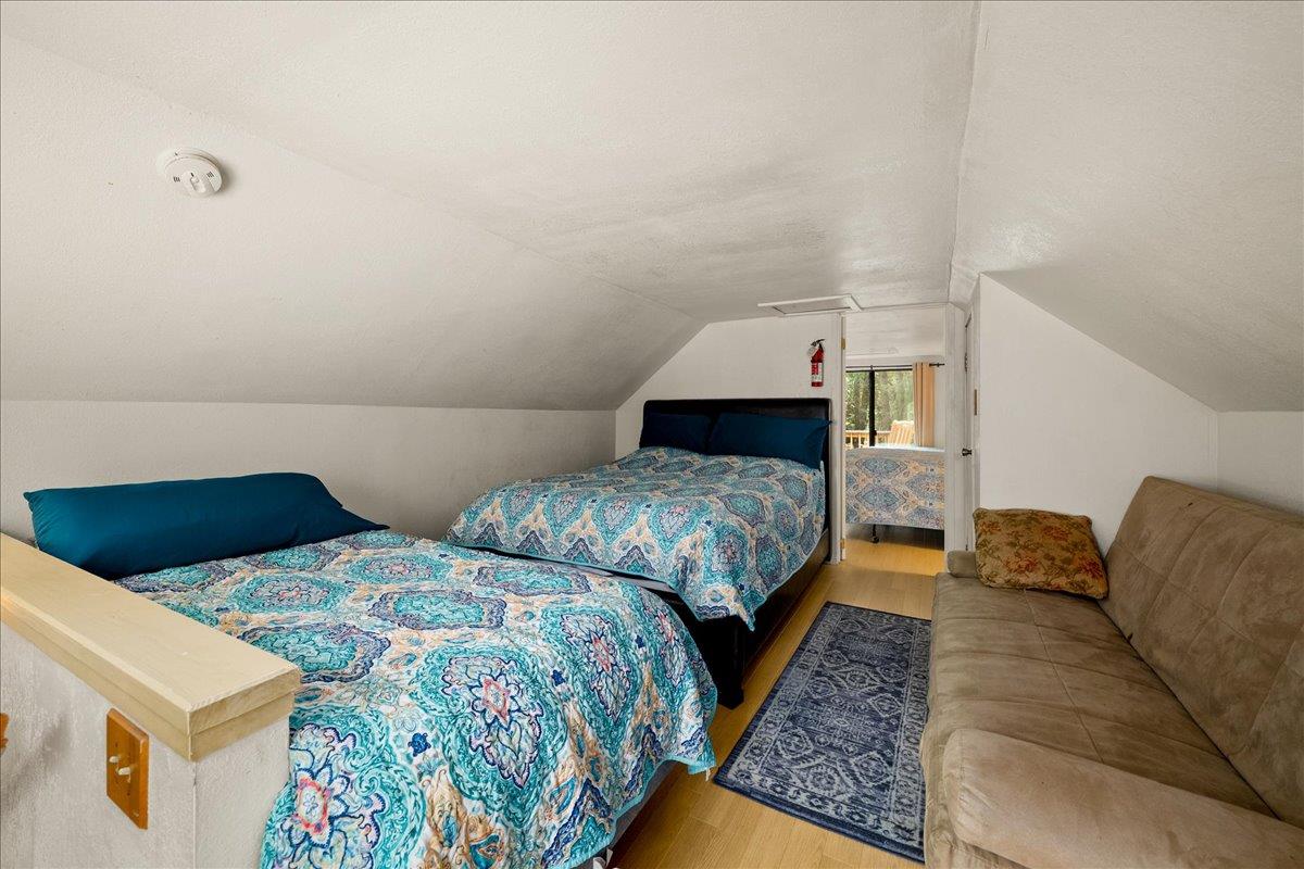 3000 Succor Lane Colfax, CA 95713 - Photo 24 of 56 a bedroom with two beds and painting on the wall