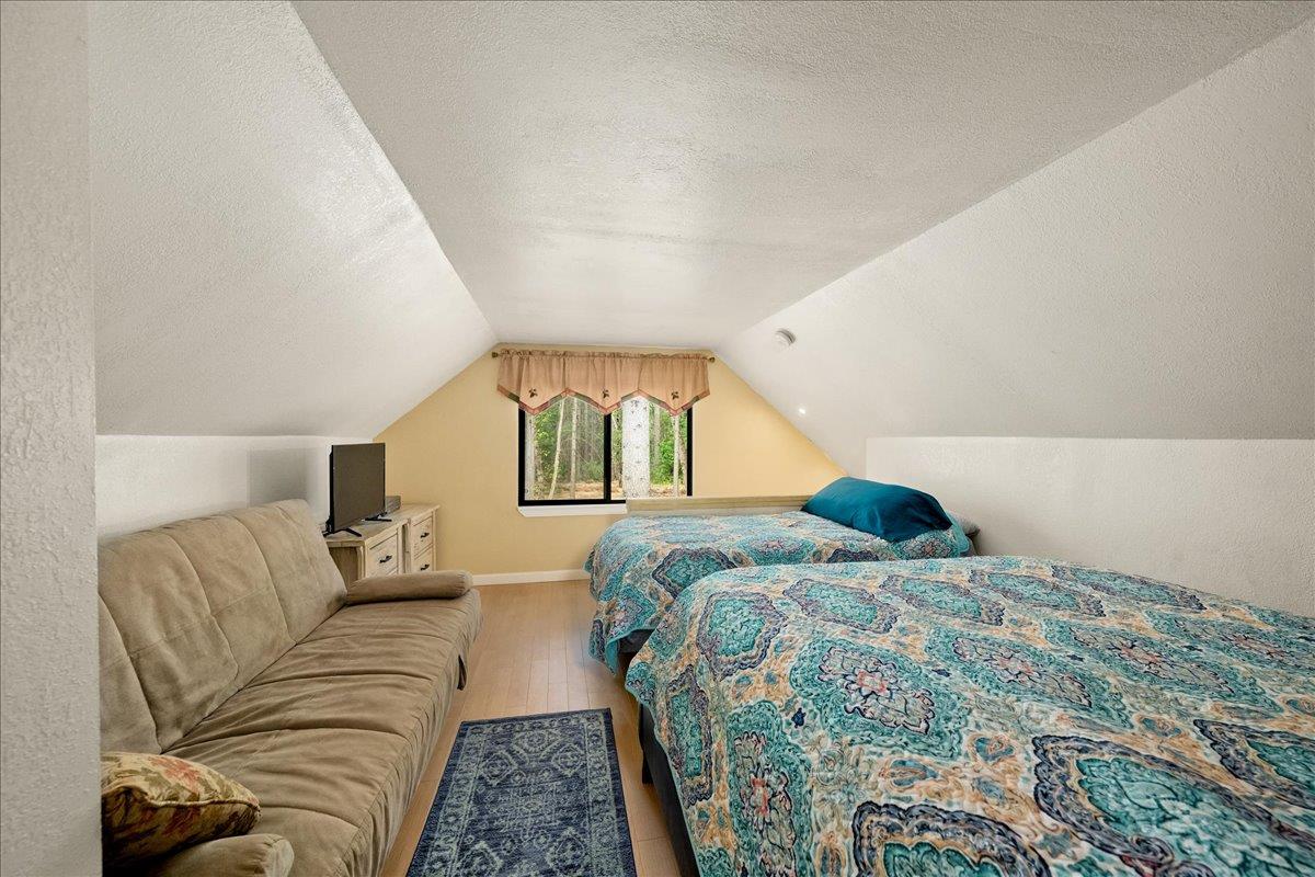 3000 Succor Lane Colfax, CA 95713 - Photo 25 of 56 a bedroom with a bed and a couch