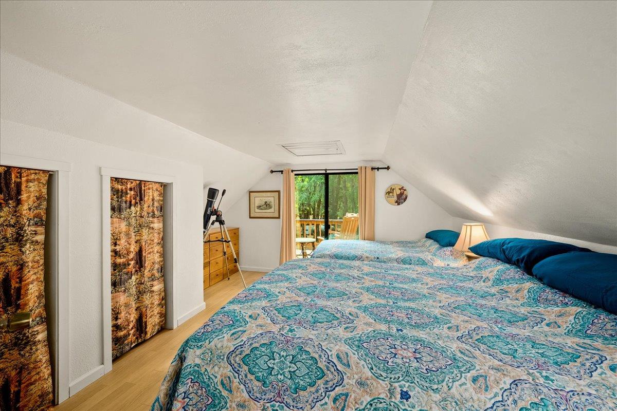 3000 Succor Lane Colfax, CA 95713 - Photo 26 of 56 a bedroom with a large bed and a window