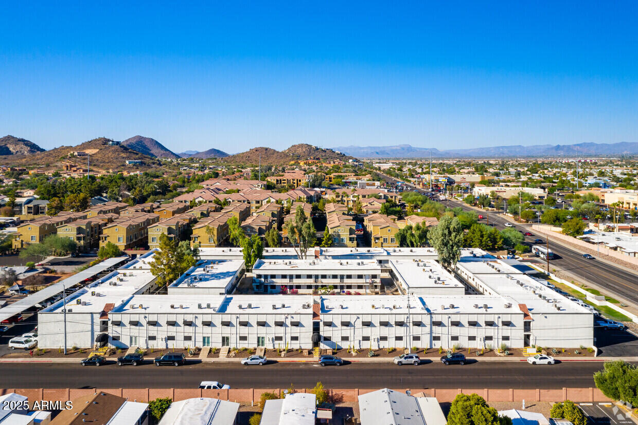 18202 Cave Creek Road, Unit 5S Phoenix, AZ 85032 - Photo 22 of 23 a view of a city with tall buildings