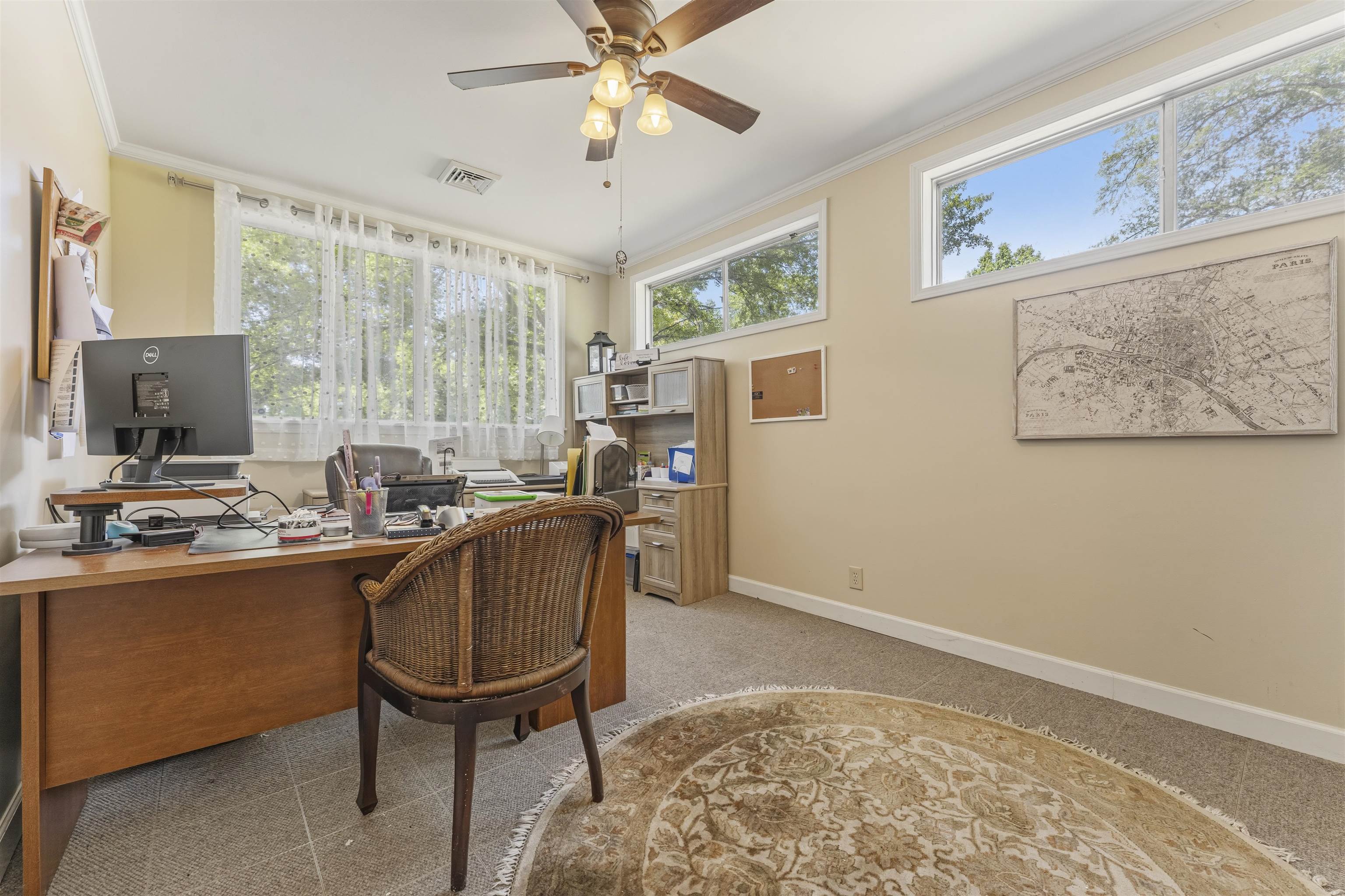 5271 Princeton Road Memphis, TN 38120 - Photo 21 of 30 Room featuring multiple windows, a ceiling fan with integrated lighting, and crown molding