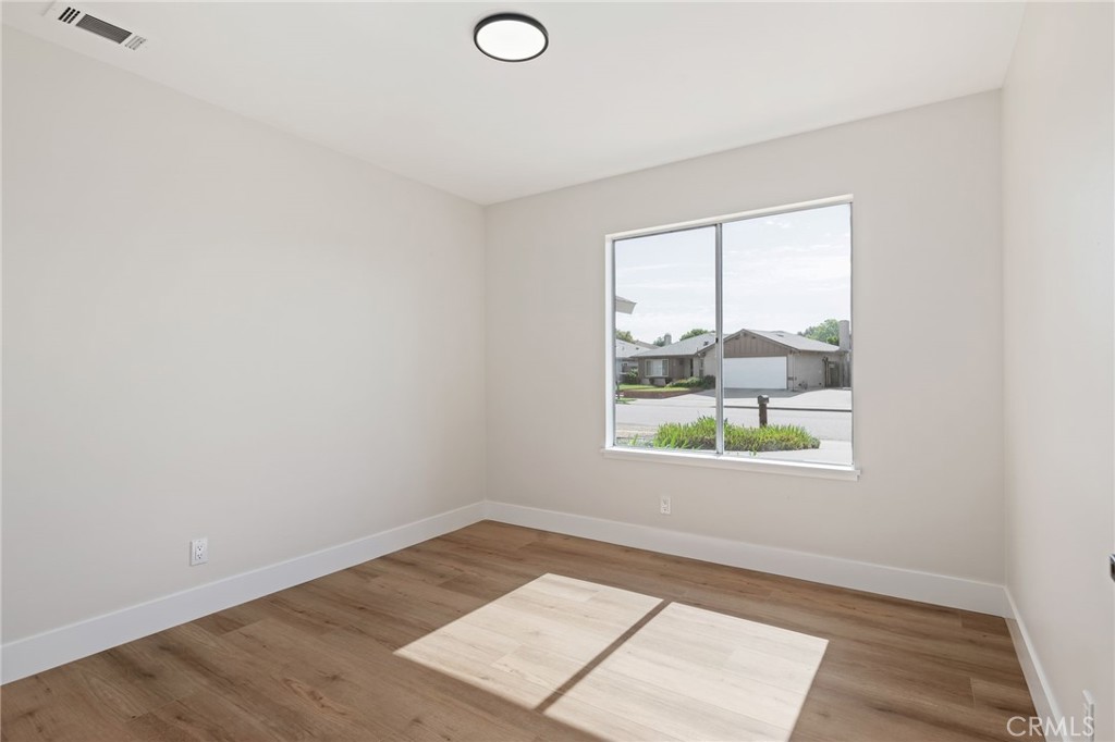 1077 Offshore Street Oxnard, CA 93035 - Photo 27 of 33 an empty room with a window