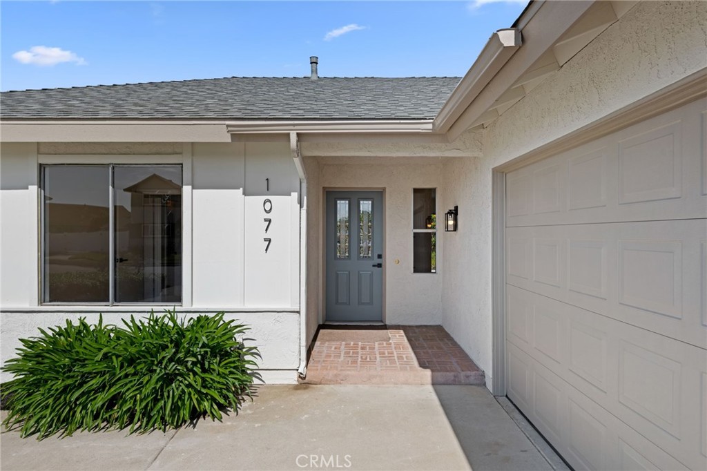 1077 Offshore Street Oxnard, CA 93035 - Photo 3 of 33 a front view of a house