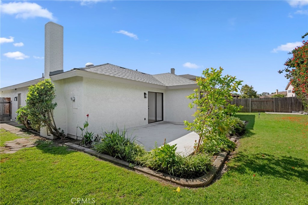 1077 Offshore Street Oxnard, CA 93035 - Photo 31 of 33 a view of a house with backyard and garden