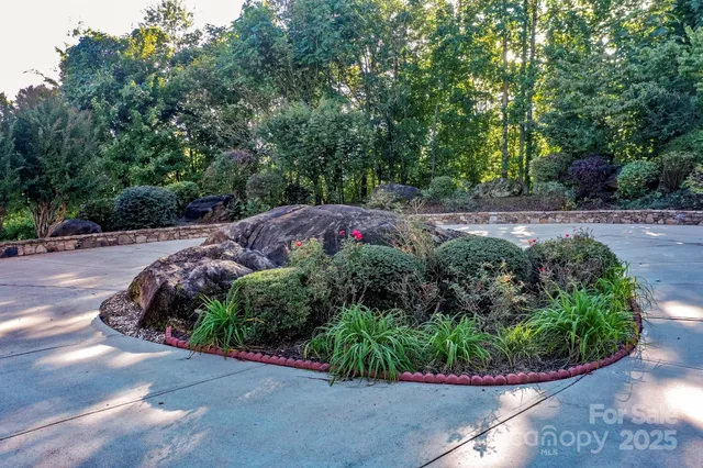 a view of a house with a garden