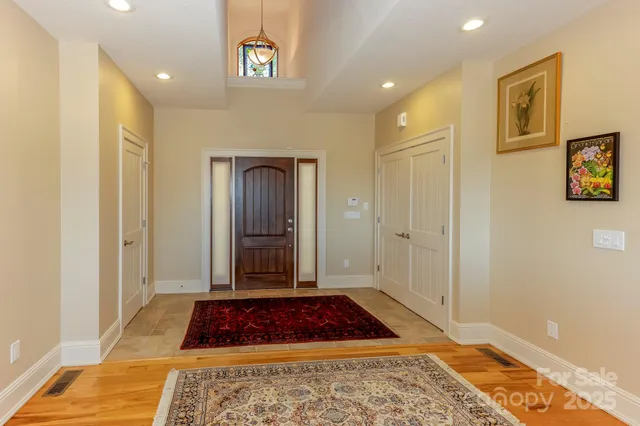 a bathroom with a rug and a shower