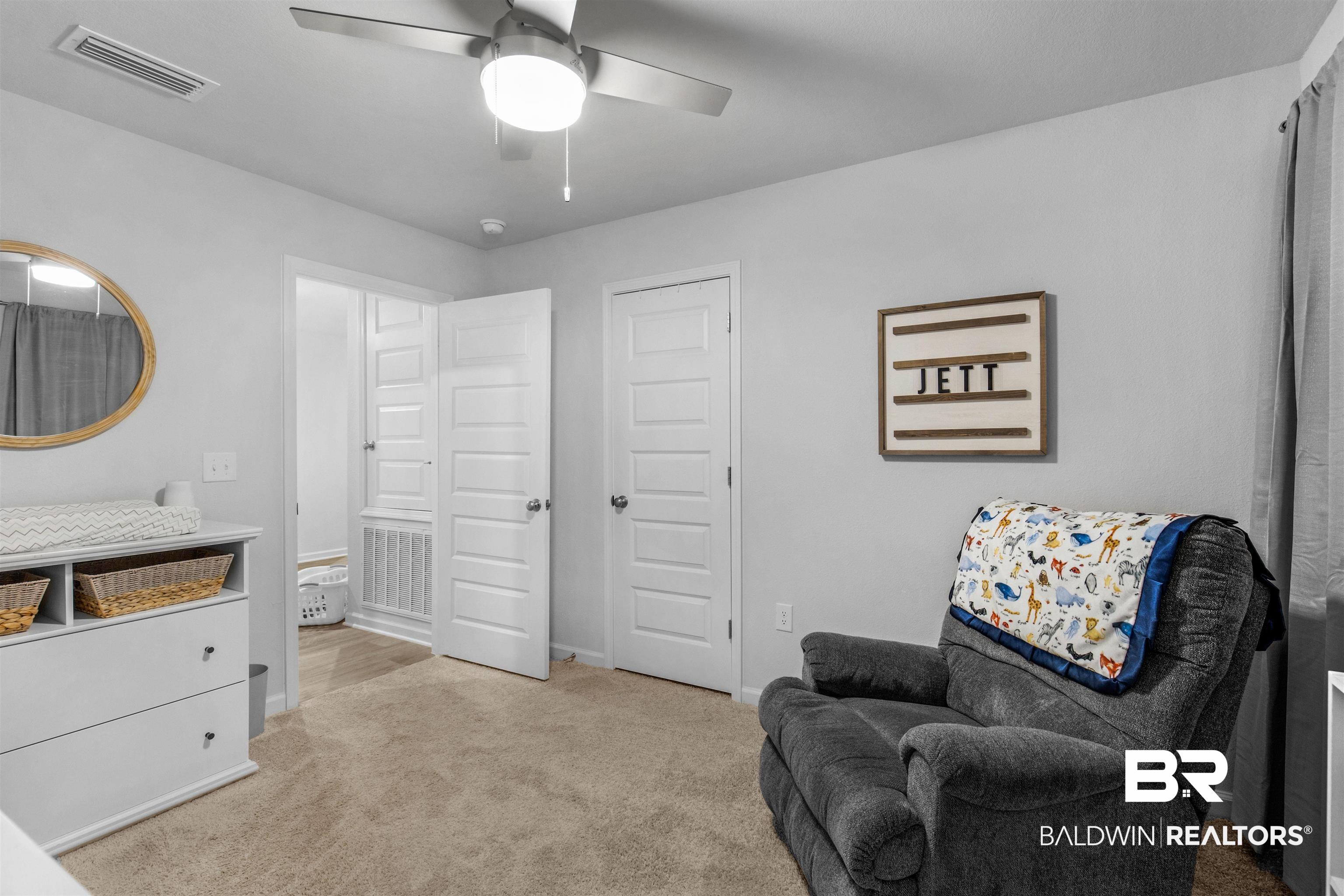 10313 Ruffian Route Daphne, AL 36526 - Photo 14 of 46 Living area featuring light colored carpet and ceiling fan