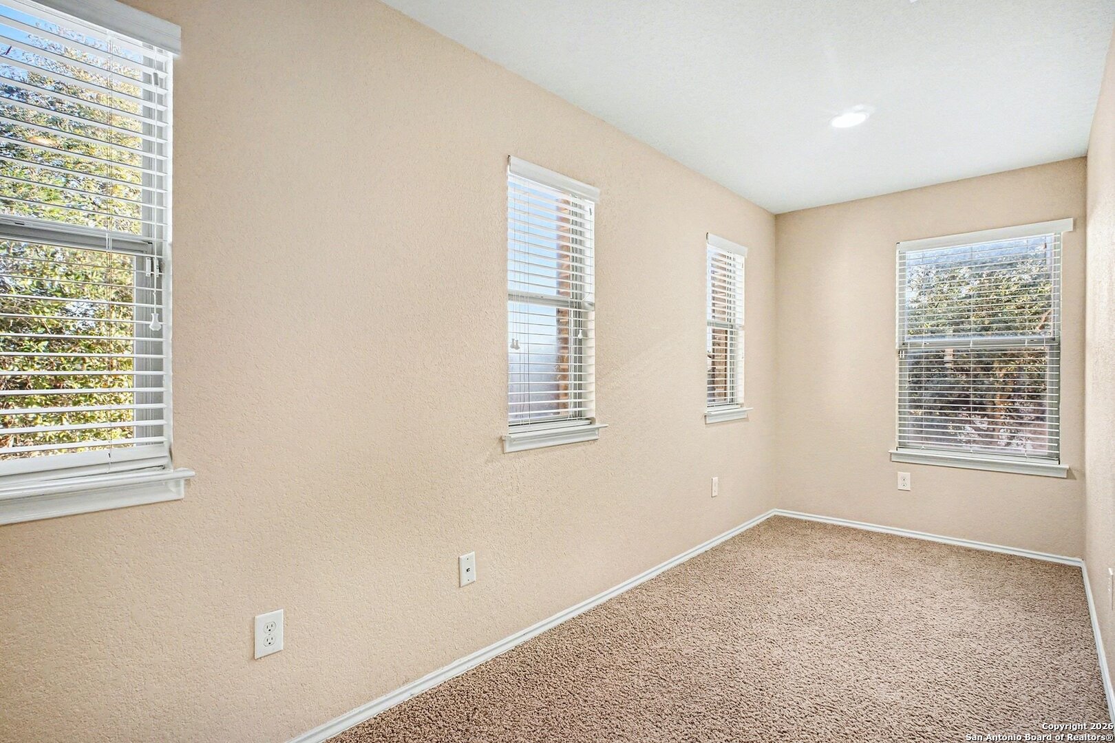 136 Prairie Falcon Boerne, TX 78006 - Photo 18 of 26 an empty room with windows