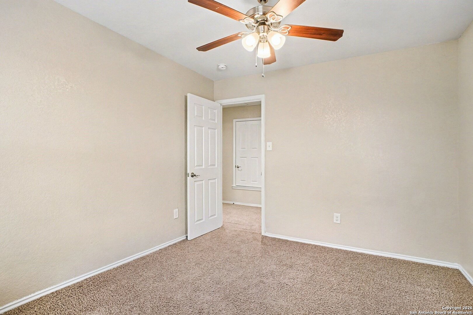 136 Prairie Falcon Boerne, TX 78006 - Photo 21 of 26 an empty room with a fan and a fan