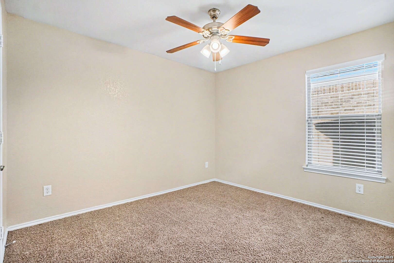 136 Prairie Falcon Boerne, TX 78006 - Photo 24 of 26 an empty room with a window