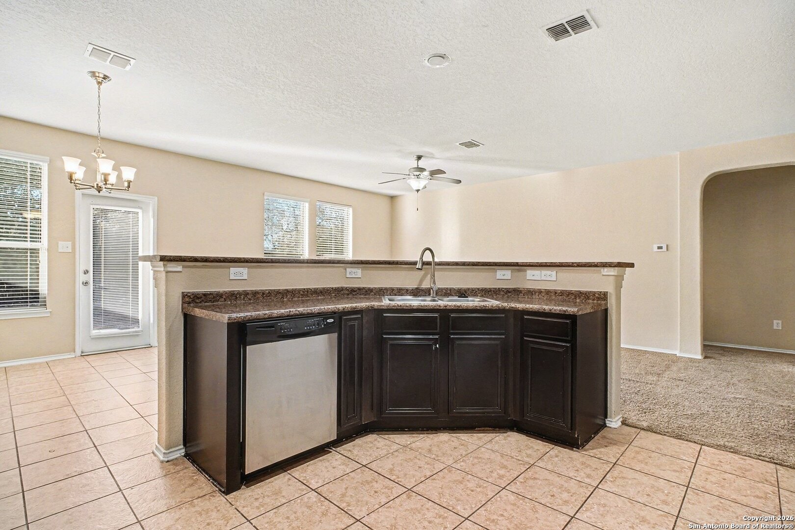 136 Prairie Falcon Boerne, TX 78006 - Photo 7 of 26 a kitchen with a sink and cabinets