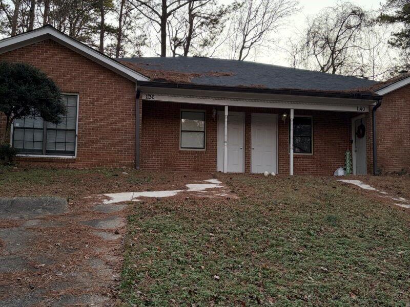 a backyard of house with large space