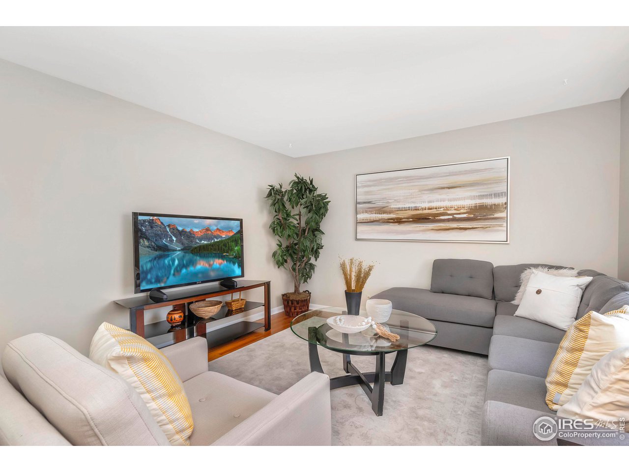 4560 Hanover Avenue Boulder, CO 80305 - Photo 13 of 27 a living room with furniture and a flat screen tv