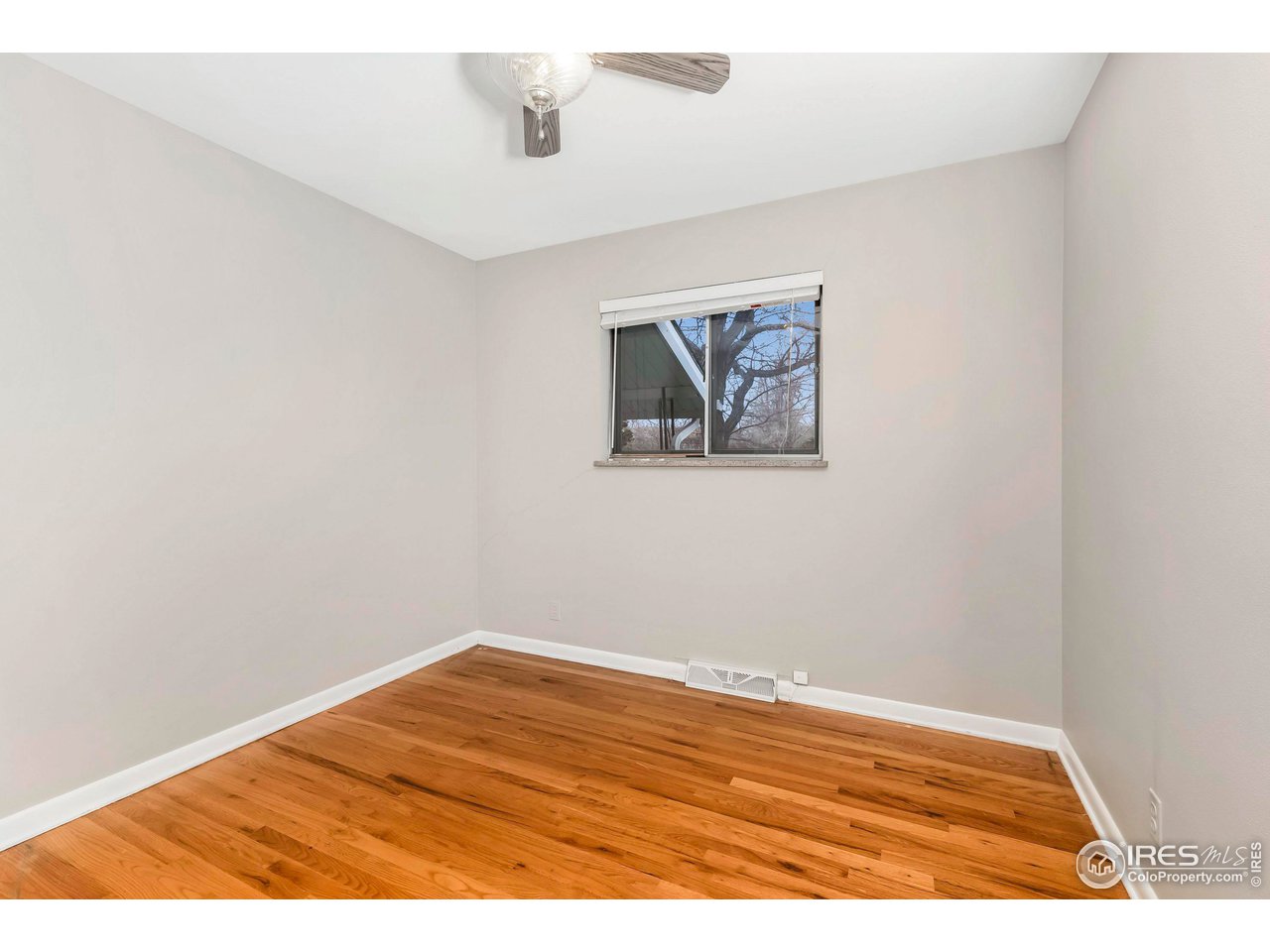 4560 Hanover Avenue Boulder, CO 80305 - Photo 14 of 27 a view of empty room with wooden floor