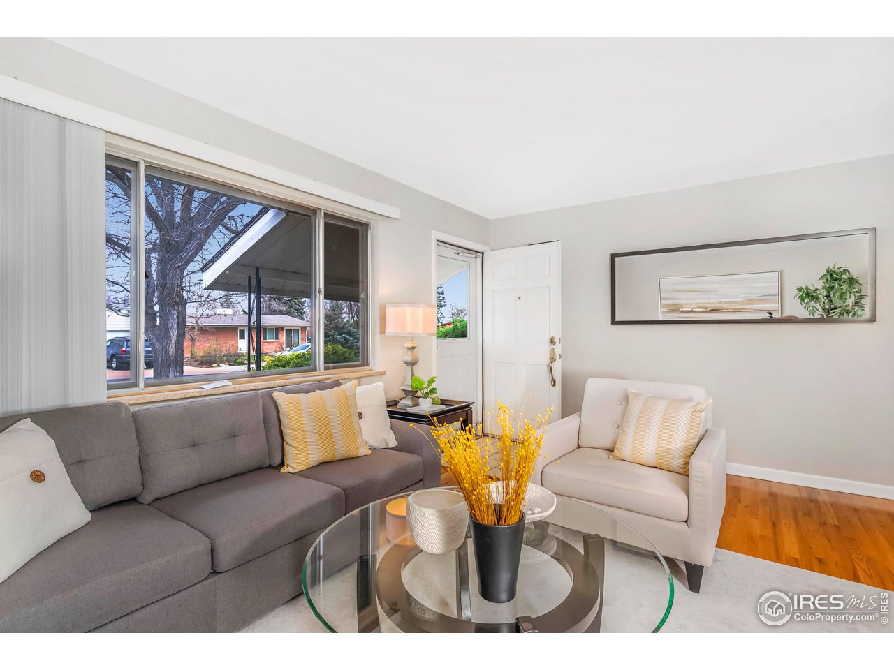 4560 Hanover Avenue Boulder, CO 80305 - Photo 15 of 27 a living room with furniture and a large window