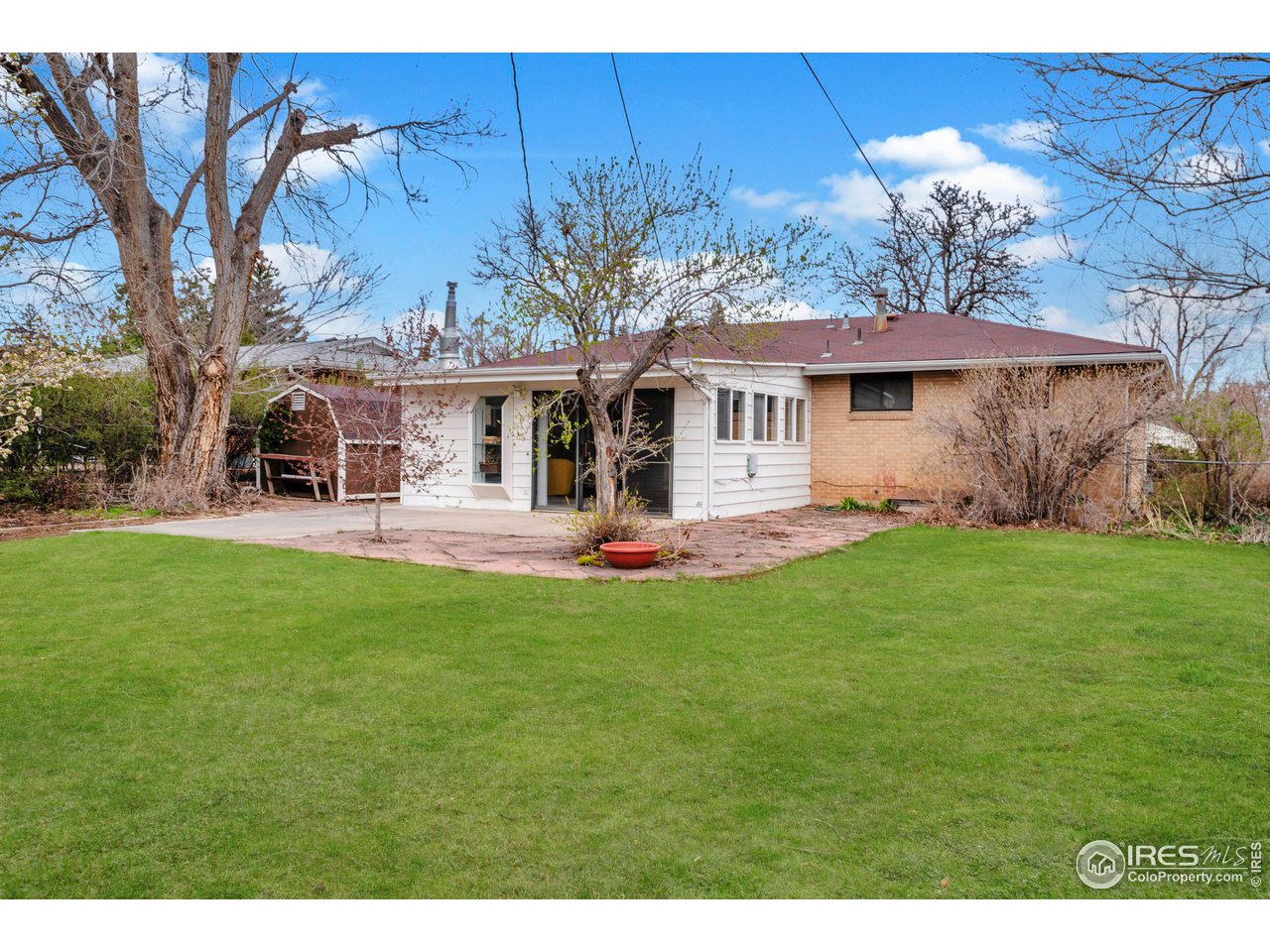 4560 Hanover Avenue Boulder, CO 80305 - Photo 20 of 27 a front view of a house with garden