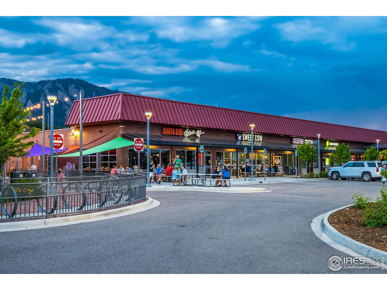 4560 Hanover Avenue Boulder, CO 80305 - Photo 26 of 27 a front view of building with retail shop and outdoor view