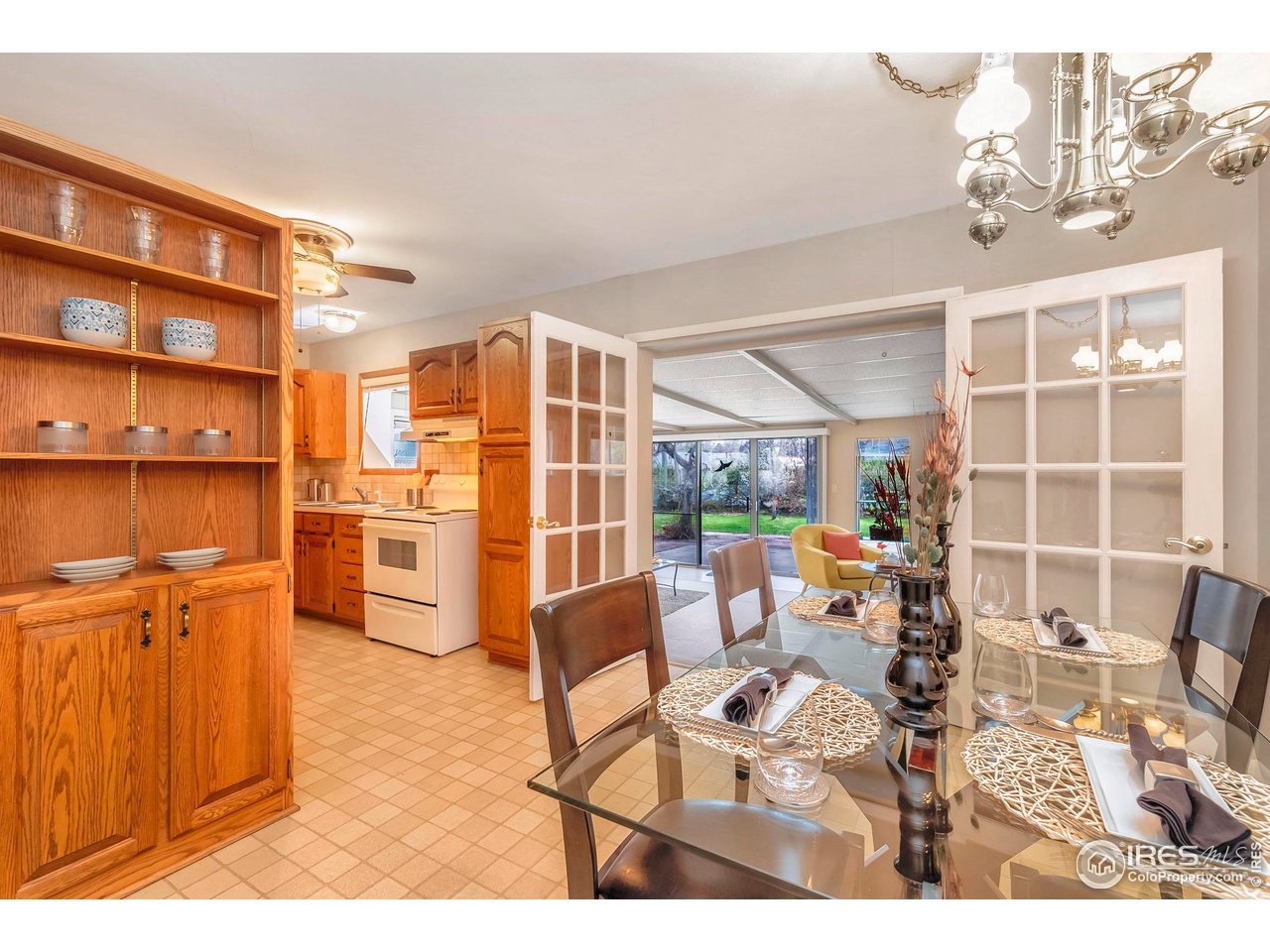 4560 Hanover Avenue Boulder, CO 80305 - Photo 6 of 27 a living room with furniture a rug and white walls