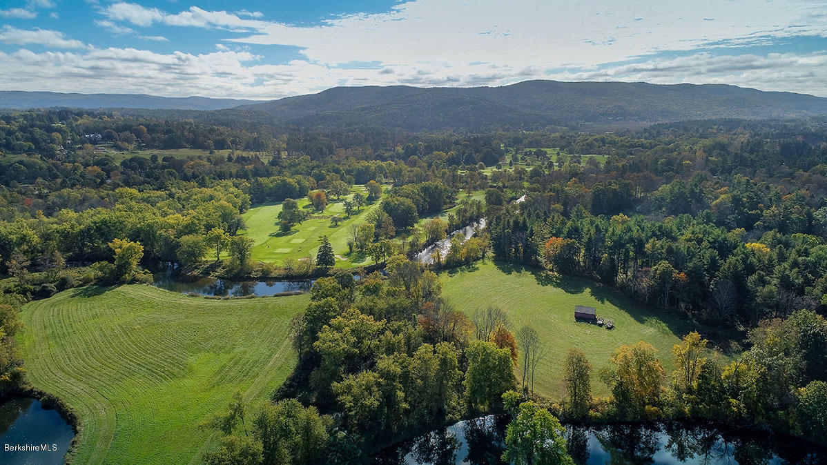 0 Glendale And Butler Road Stockbridge, MA 01262 - Photo 3 of 3 a view of a city with mountains in the background