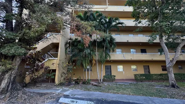 a front view of house with a yard