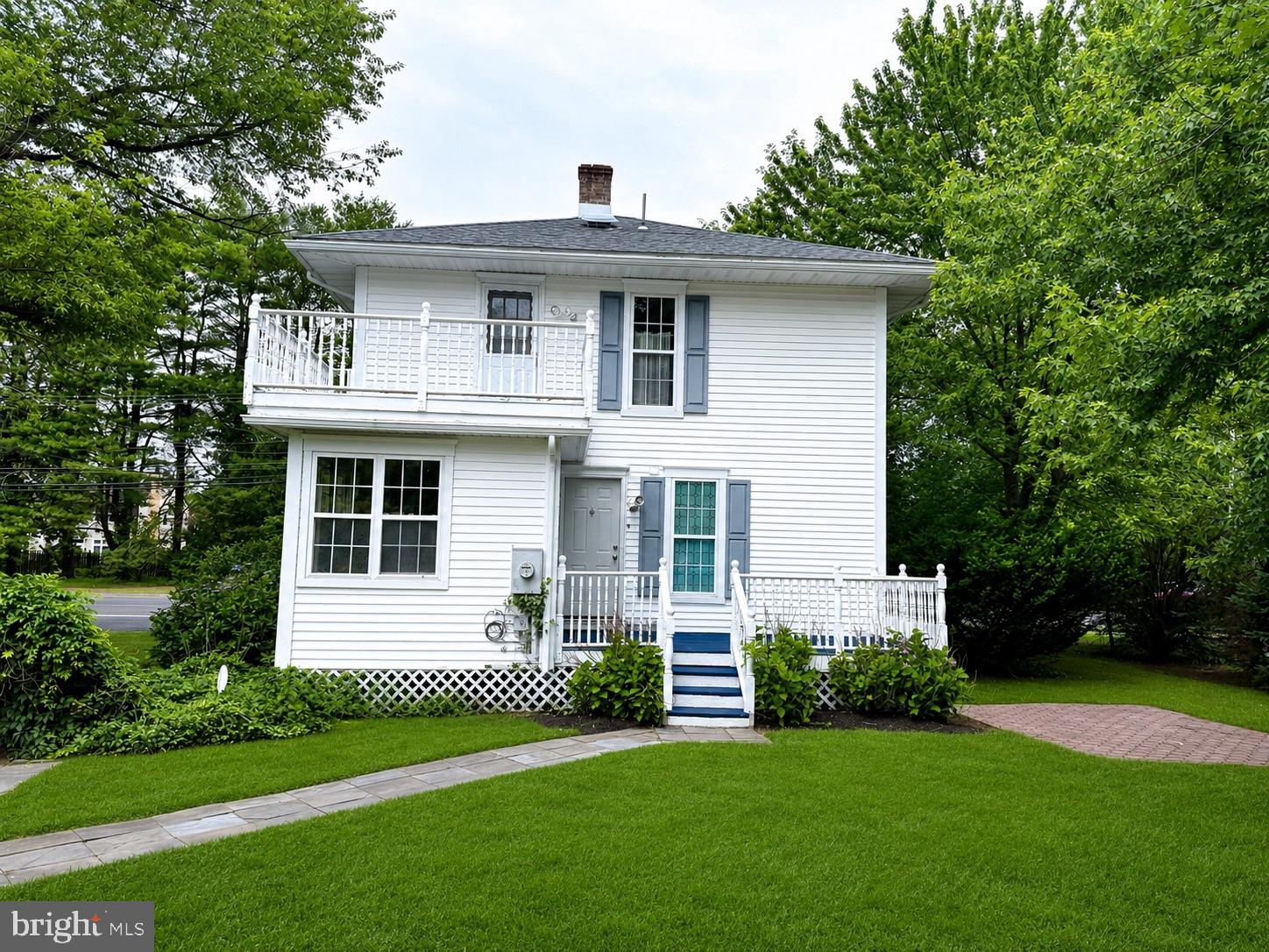 908 Union Road Mount Laurel, NJ 08054 - Photo 2 of 2 Charming two-story home with lush greenery.