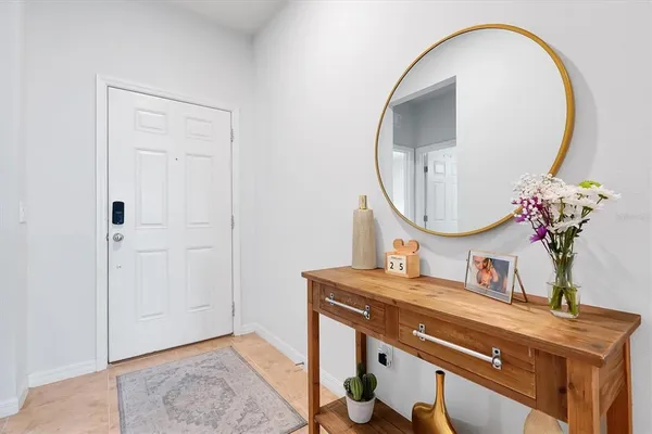 a room with a mirror and a mirror