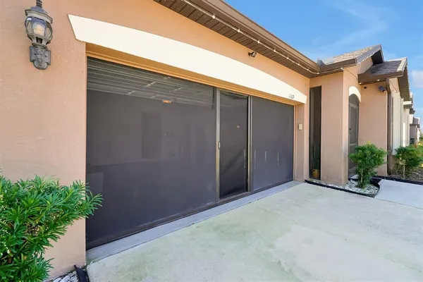 an aerial view of residential houses with city view