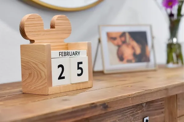 a close view of a sink a stove and a microwave oven