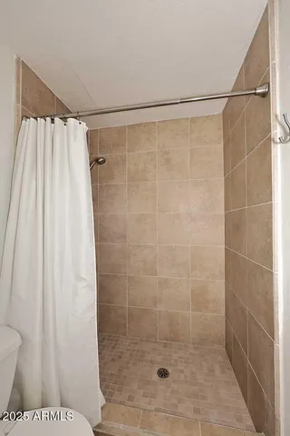 a view of a room with a large window