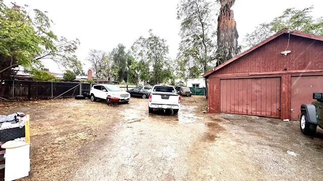 a view of a car parked in front of a house