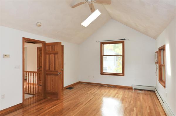 36 Arrowhead Road Concord, MA 01742 - Photo 6 of 14 an empty room with wooden floor closet and windows