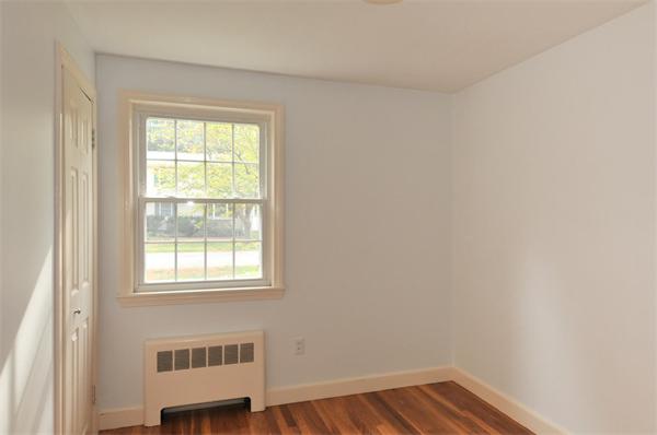 36 Arrowhead Road Concord, MA 01742 - Photo 9 of 14 an empty room with a window