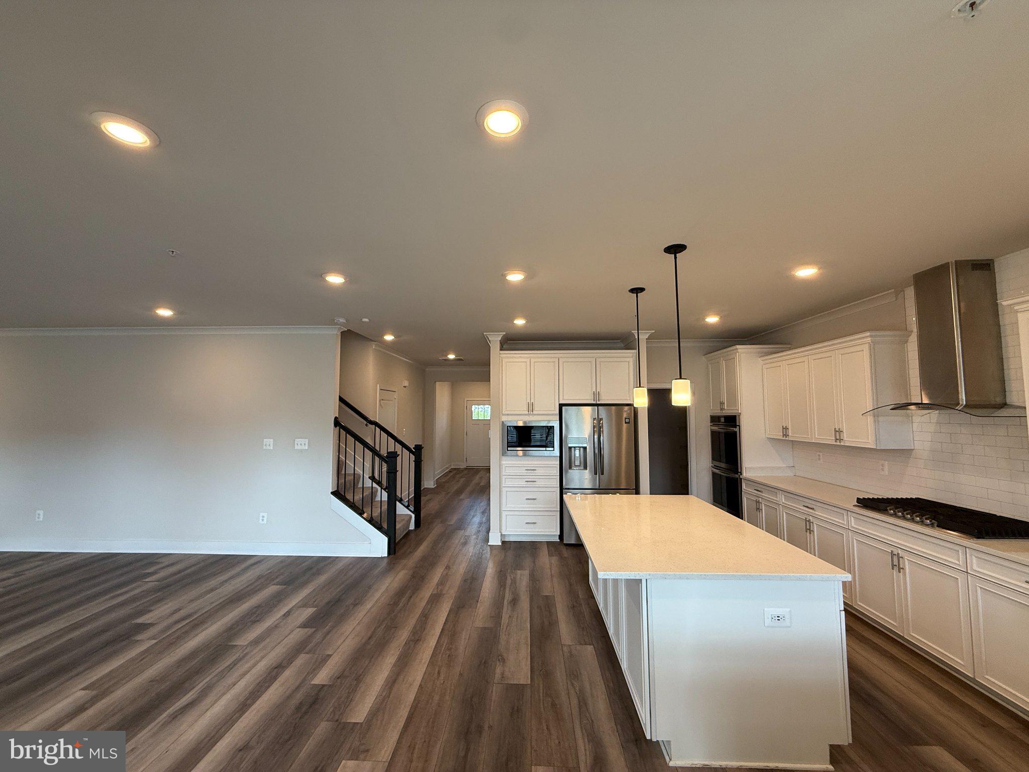 1407 Pinkerton Street Brunswick, MD 21716 - Photo 5 of 21 Spacious modern kitchen with elegance.
